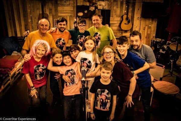 A family posing for a picture in Liverpool