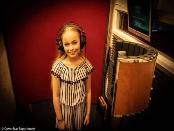 Birthday girl posing in the vocal booth