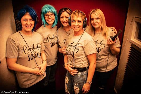 A group of ladies getting ready to sing in