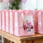 Pink hen party gift bags filled with party accessories
