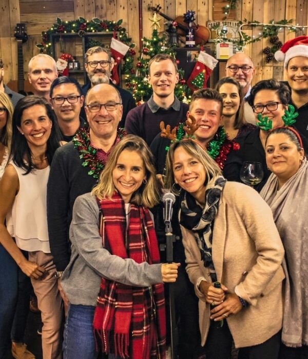 A corporate group celebrating at their Christmas party